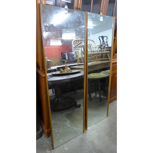 101 - A pair of teak framed mirrors