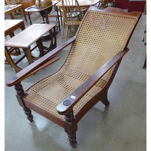 102 - A 19th Century style teak bergere plantation chair