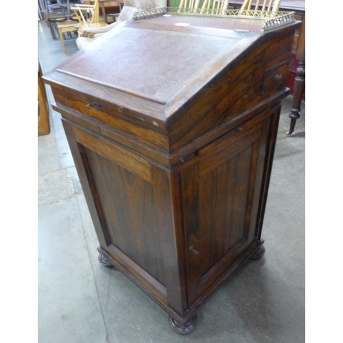 106 - A Victorian rosewood Davenport