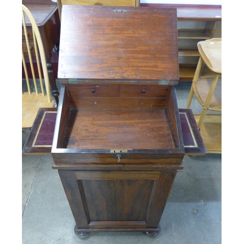 106 - A Victorian rosewood Davenport