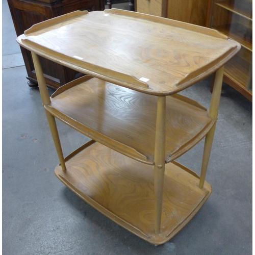 11 - An Ercol Blond elm and beech Windsor trolley