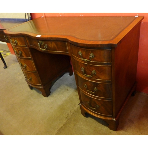 114 - A George III style Bevan Funnell mahogany and green leather topped desk