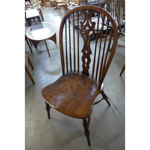 118 - A set of six 19th Century style elm Windsor chairs