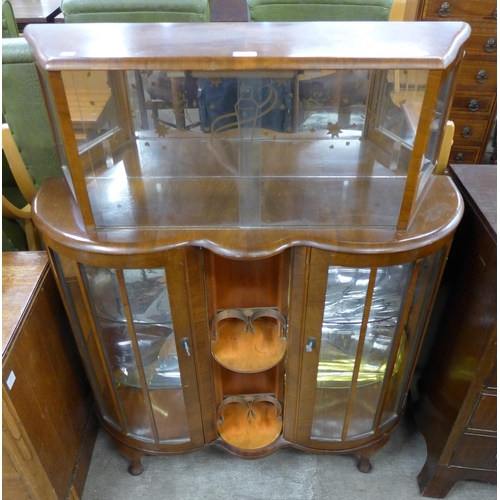 124 - An Art Deco walnut cocktail display cabinet