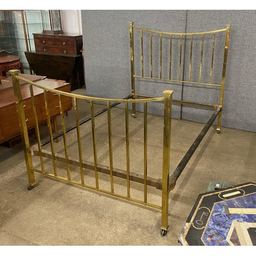 132 - A Victorian brass double bed