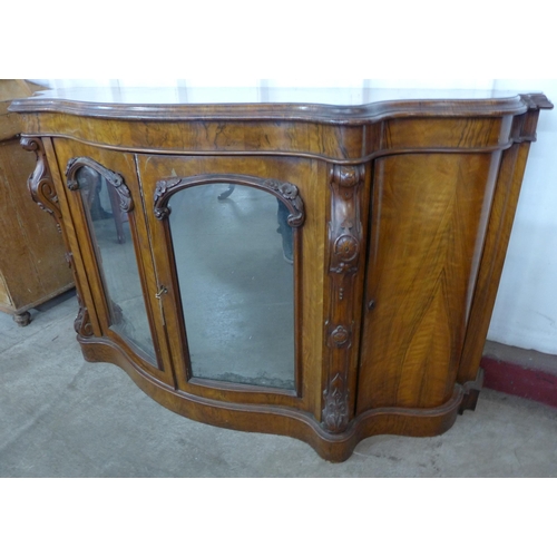 134 - A Victorian walnut serpentine credenza