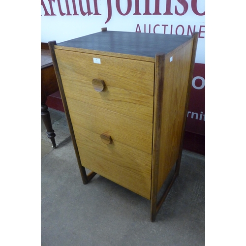 14 - A teak chest of drawers