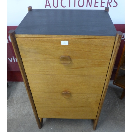 14 - A teak chest of drawers