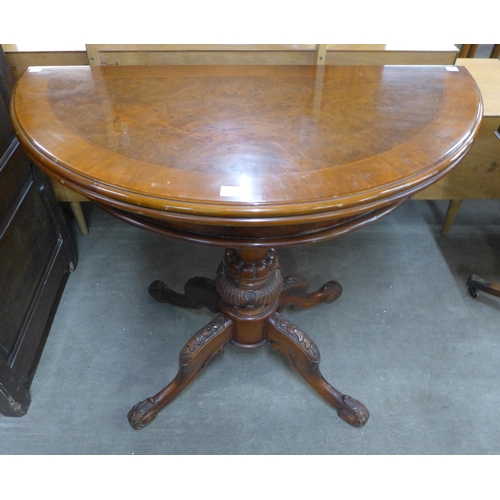 147 - A French walnut and burr walnut demi lune fold pedestal tea table