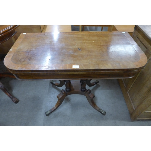 149 - A George IV mahogany D-shaped fold over pedestal card table