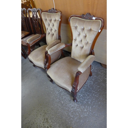 162 - A pair of Edward VII mahogany and fabric upholstered armchairs