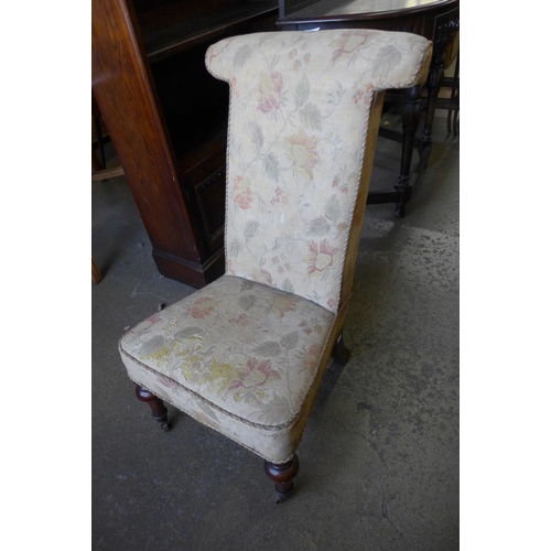 165 - A Victorian rosewood and fabric upholsted prie dieu