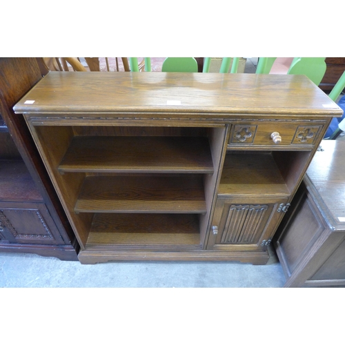 167 - An Old Charm carved oak open bookcase