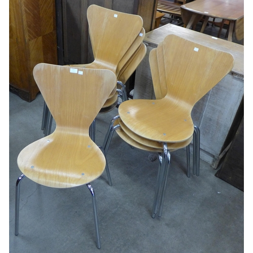 173 - A set of eight Fritz Hanson style chrome and bent plywood stacking chairs