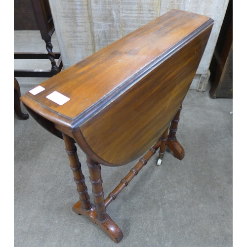 176 - A Victorian walnut Sutherland table