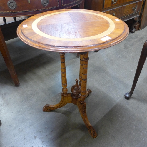 180 - A Victorian walnut circular occasional table