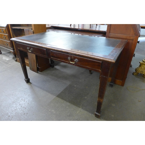 186 - An Edward VII style mahogany and leather topped two drawer writing table