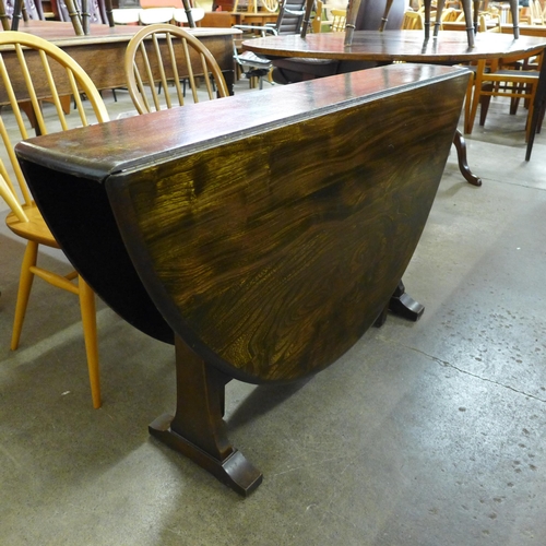 188A - A Ercol Golden Dawn elm drop leaf table