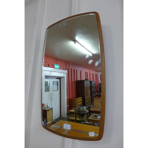 19 - A teak framed mirror