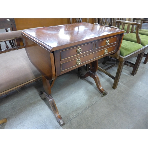 194 - A small Regency style mahogany drop leaf sofa table