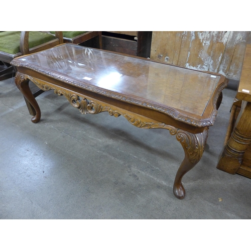 198 - A burr walnut coffee table