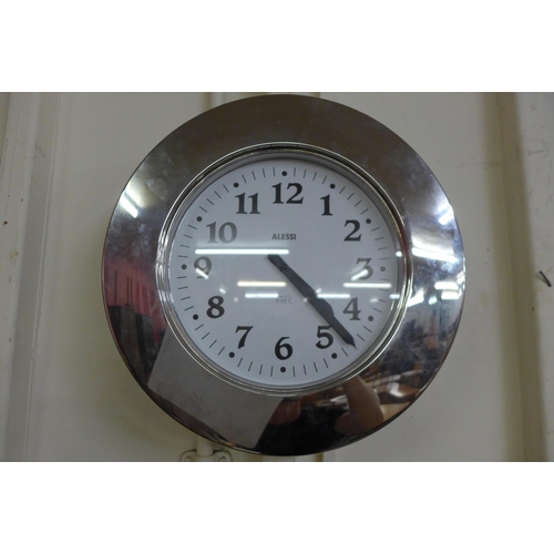 20 - A teak framed  mirror and a contemporary wall clock