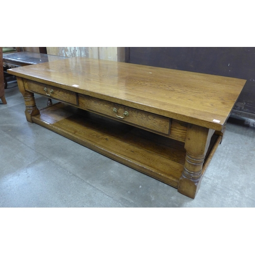 201 - A large oak two drawer coffee table