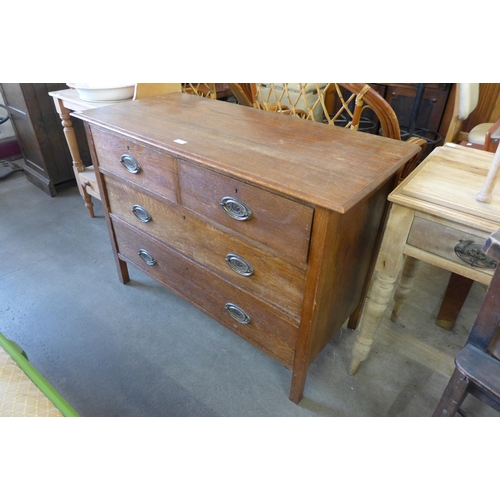 216 - An Edward VII oak chest of drawers