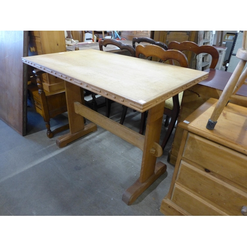 223 - Two small Cotswold School oak refectory tables