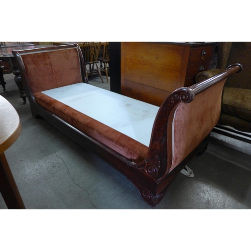 233 - A 19th Century Biedermeier mahogany single sleigh bed