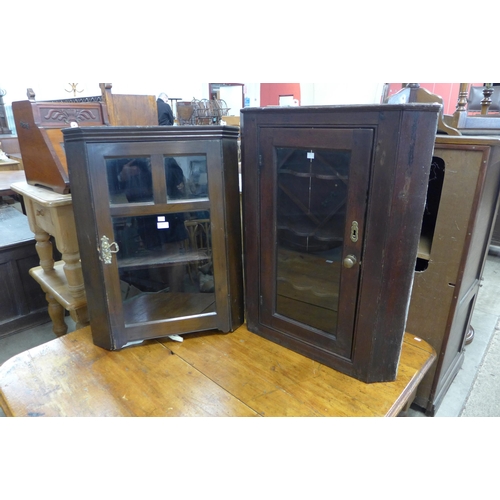 248 - Two George III oak wall hanging corner cabinets