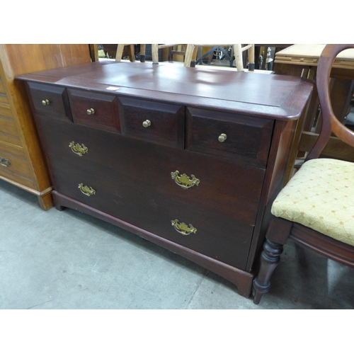 258 - A Stag oak chest of drawers