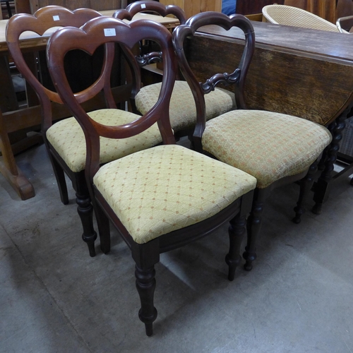 259 - A Harlequin set of four Victorian mahogany balloon back dining chairs