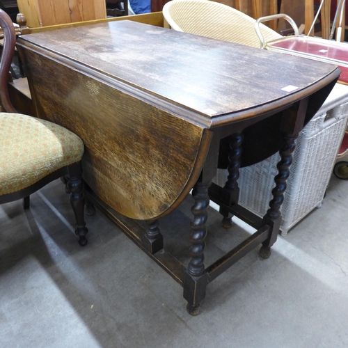 260 - An oak barleytwist gateleg table