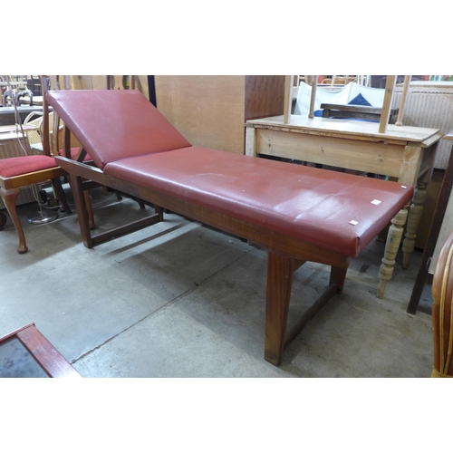 263 - A vintage beech examination couch