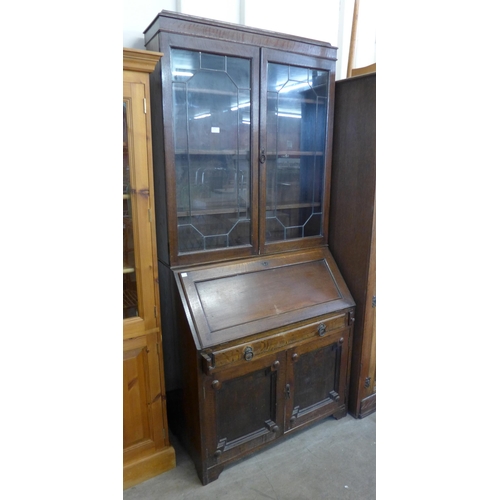 269 - An early 20th Century oak bureau bookcase