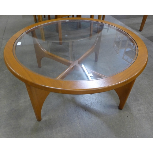 27 - A Stonehill Stateroom teak and glass topped circular coffee table