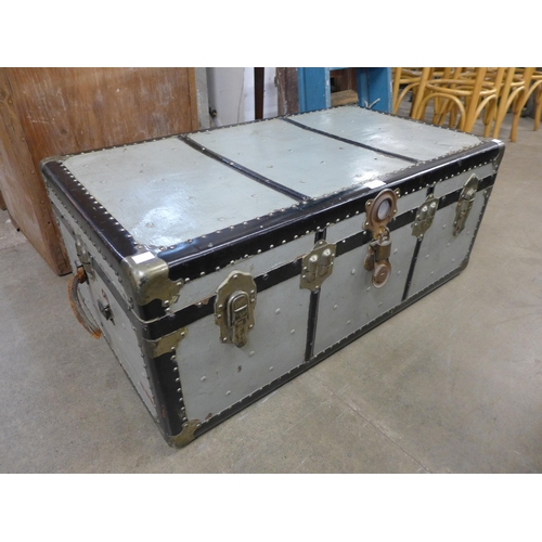 273 - A steel steamer trunk