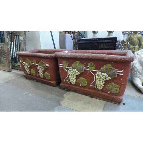 284 - A pair of painted terracotta garden planters