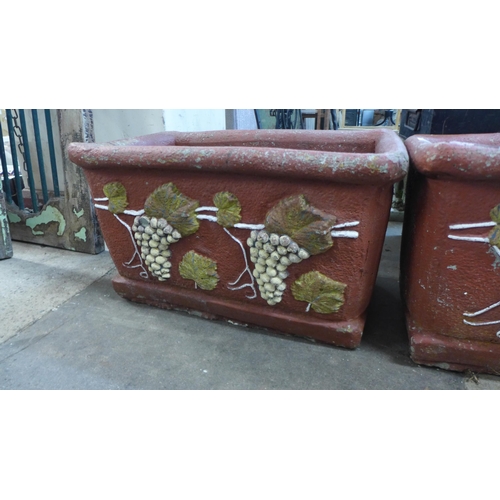 284 - A pair of painted terracotta garden planters