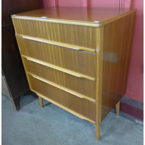 3 - A teak chest of drawers