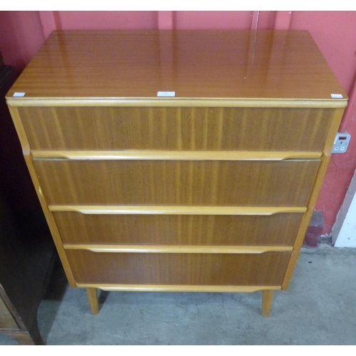 3 - A teak chest of drawers