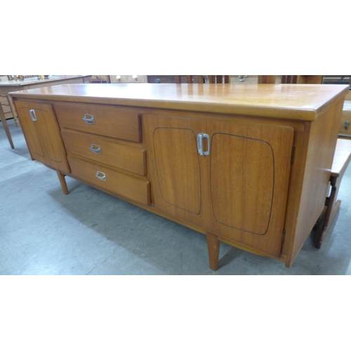 30 - A teak sideboard