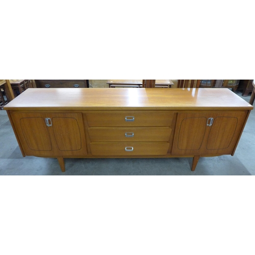 30 - A teak sideboard