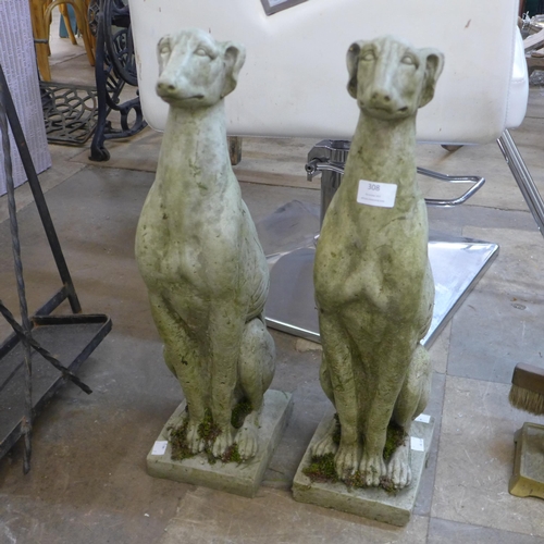 308 - Two concrete garden figures of greyhounds