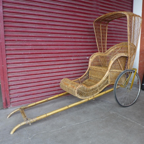 310A - A vintage 1970's cane rickshaw