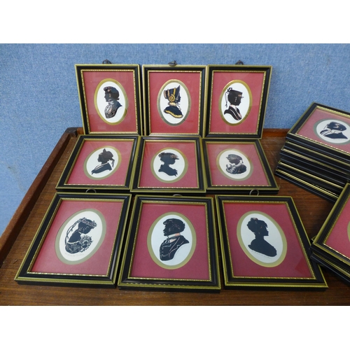 327 - A set of eighteen miniature silhouettes, framed