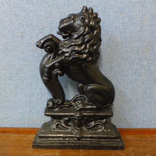 347 - A 19th Century cast iron figural lion door porter