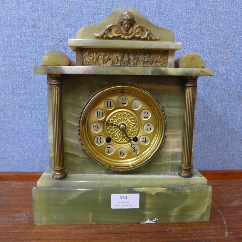 351 - An early 20th Century French onyx mantel clock