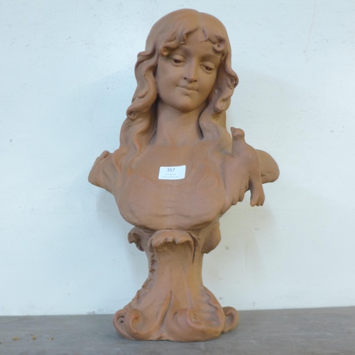 357 - An Art Nouveau style faux terracotta bust of a lady